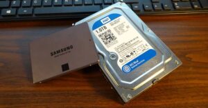 Solid state drive next to a mechanical hard drive showing the SSD upgrade that makes older computers faster